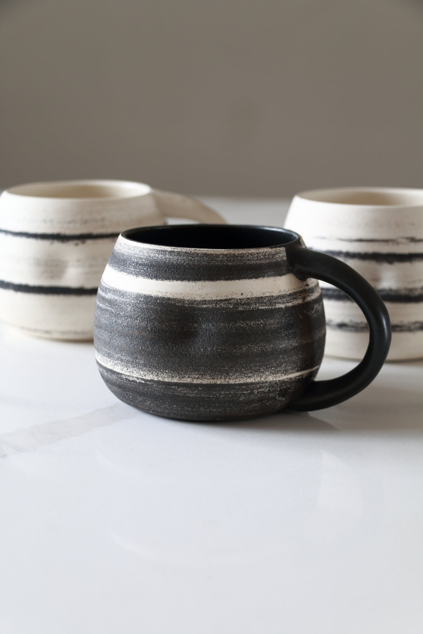 Meta-Morphic Pebble Mug • Black • 16oz