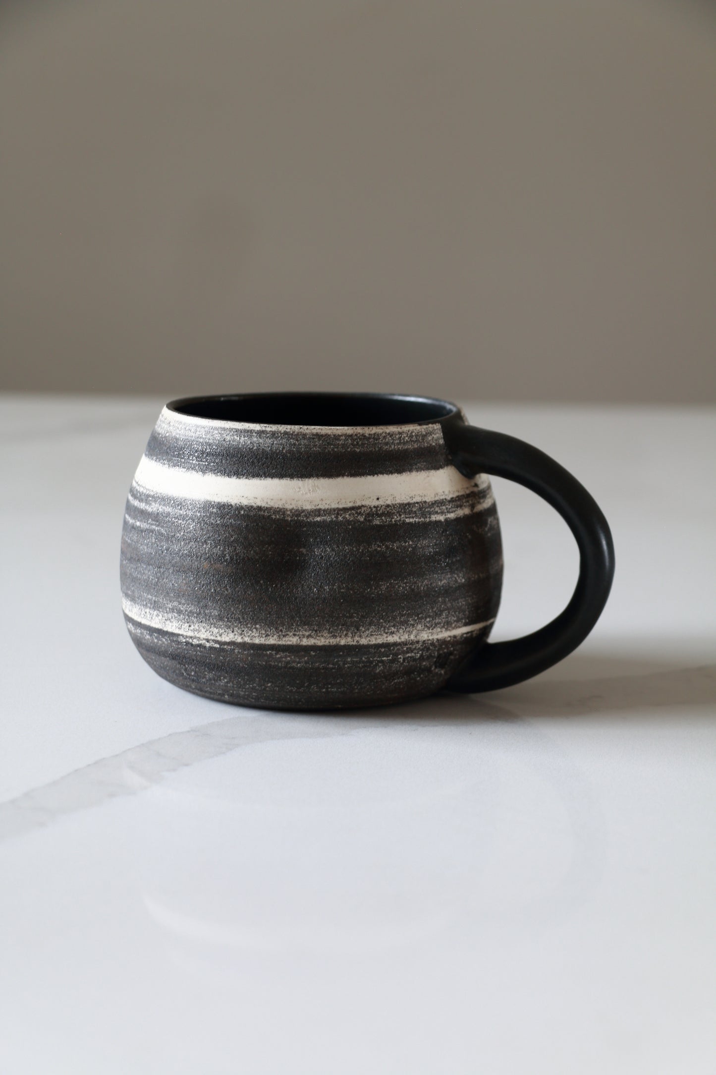 Meta-Morphic Pebble Mug • Black • 16oz